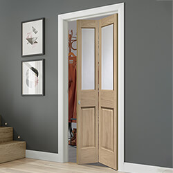 XL Joinery Malton Internal Bi-fold Door with 2 Panel and 2 Bevelled Glazed Light - Unfinished Oak