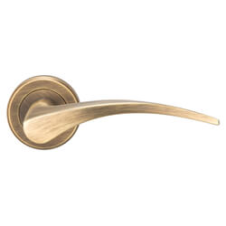 Carlisle Brass Serozzetta Olivier Designer Arched Lever Handle on Round Rose