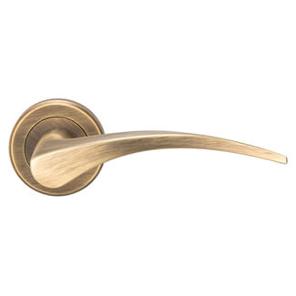 Carlisle Brass Serozzetta Olivier Designer Arched Lever Handle on Round Rose